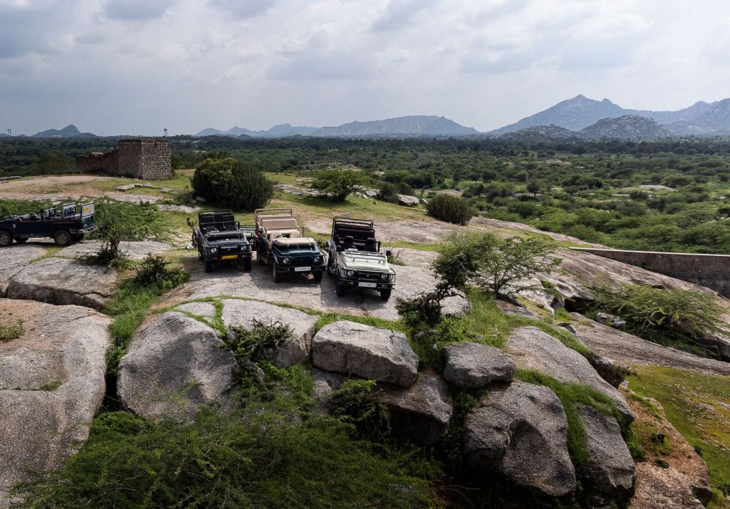 Open safari jeeps among Jawai's granite hills